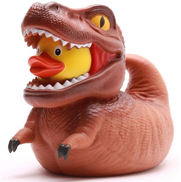 Pato de goma T-Rex marrón con patito amarillo en la boca y dientes afilados
