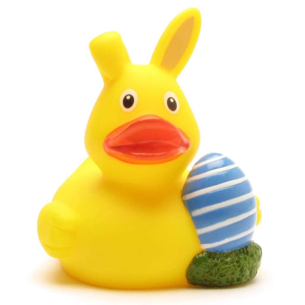 Pato de goma de Pascua con huevo azul decorativo y orejas de conejo caídas
