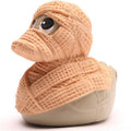 Pato de goma momia vista frontal detalle ojos