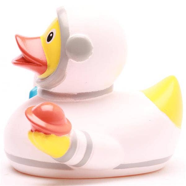 Patito de goma astronauta con casco y ovni naranja vista lateral