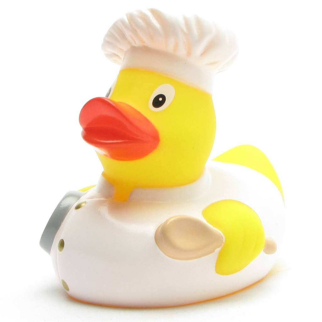 Patito de goma cocinero con uniforme blanco vista frontal izquierda