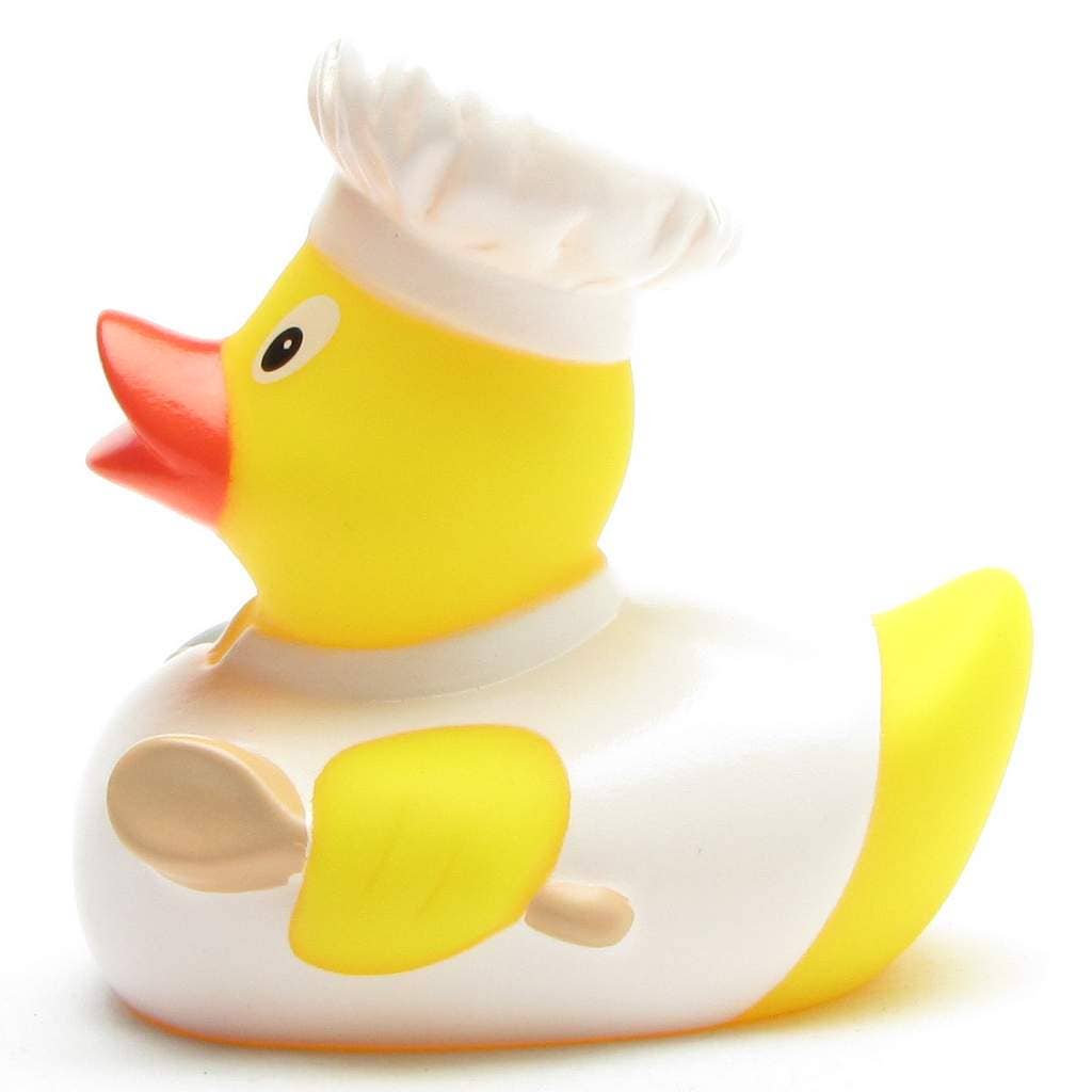 Patito de goma cocinero con uniforme blanco vista lateral izquierda