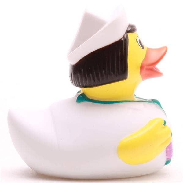 Patito de goma enfermera con estetoscopio y jeringa vista lateral derecha