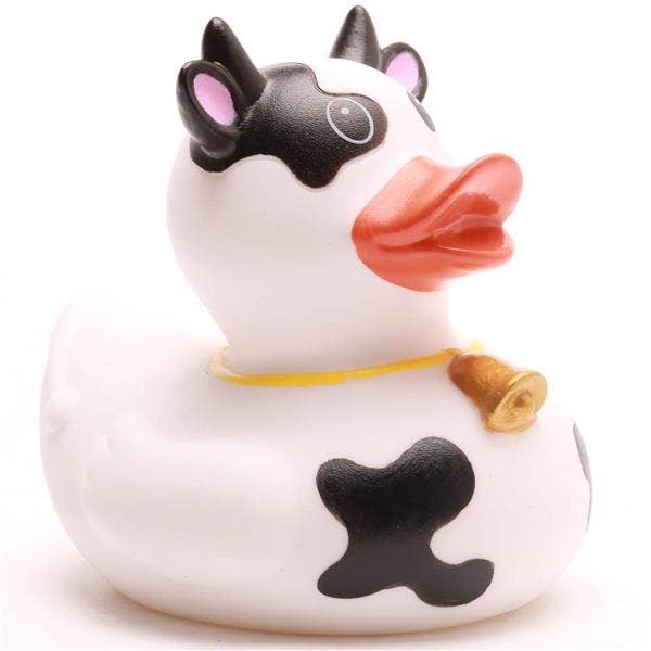 Patito de goma vaca blanca y negra de frente