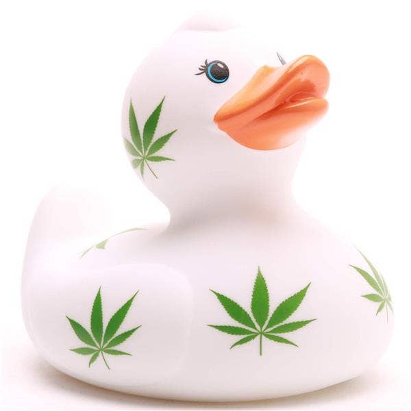 Pato de baño blanco con diseño de hojas verdes