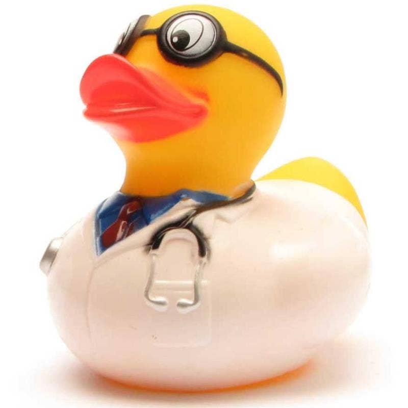 Pato de goma doctor con bata blanca y estetoscopio