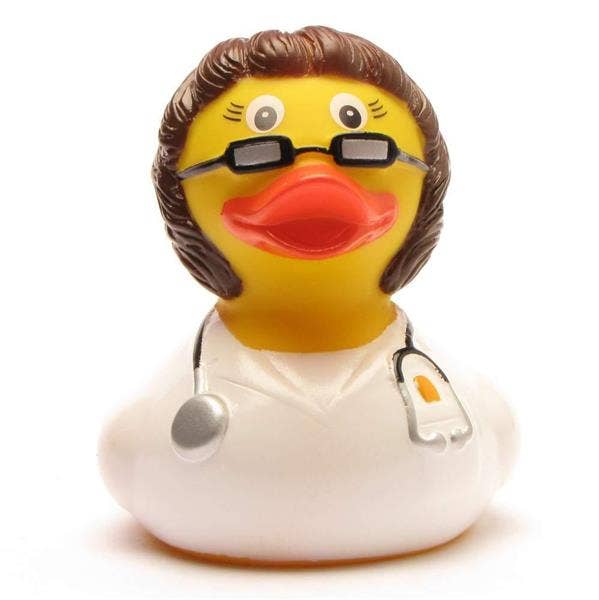 Pato de goma doctora morena con gafas y bata blanca vista frontal