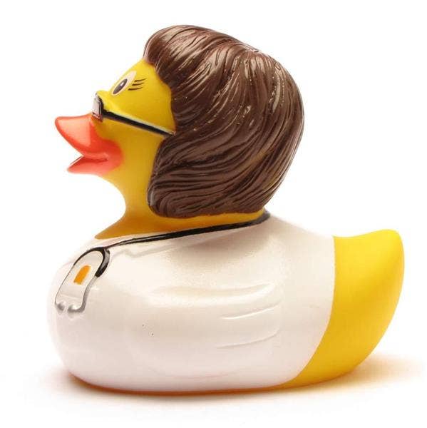 Pato de goma doctora morena con gafas y bata blanca vista lateral