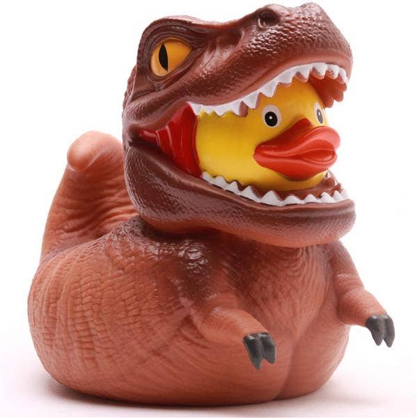 Pato de goma T-Rex XL marrón con dientes y cola desde un ángulo lateral