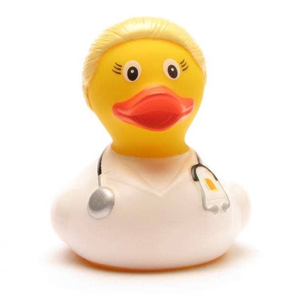 Pato de goma doctora rubia con bata blanca y estetoscopio