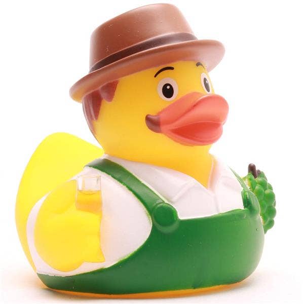 Detalle pato de goma vinicultor con sombrero y copa